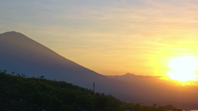 Majestic Silhouette of Mount Agung Volcano at Sunrise in Bali