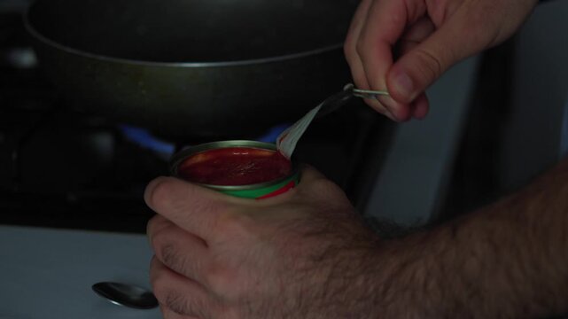 person washing dishes in a modern kitchen sink. Domestic chores, household duties, daily routine, and clean tableware concept with running water and blue plates.