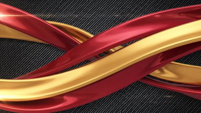 Abstract red and gold metallic ribbons on carbon fiber.