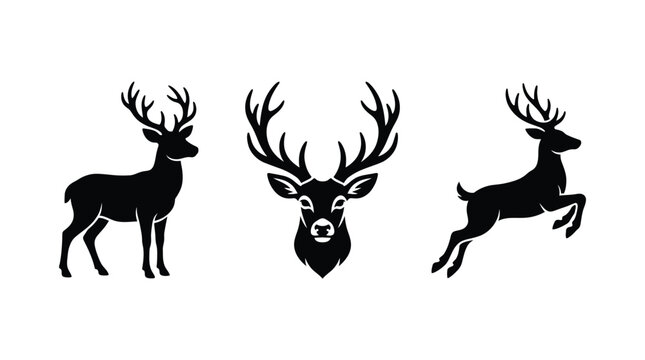 Black silhouettes of deer in standing