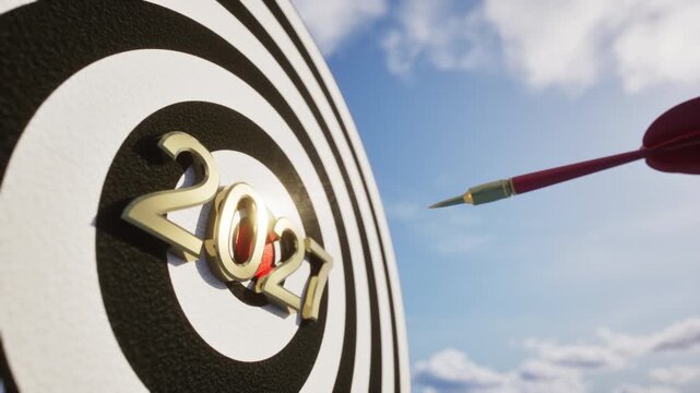 Slow motion Closeup Red dart arrow in bullseye under bright sun. 2027 roadmap to success concept. 3D animation.