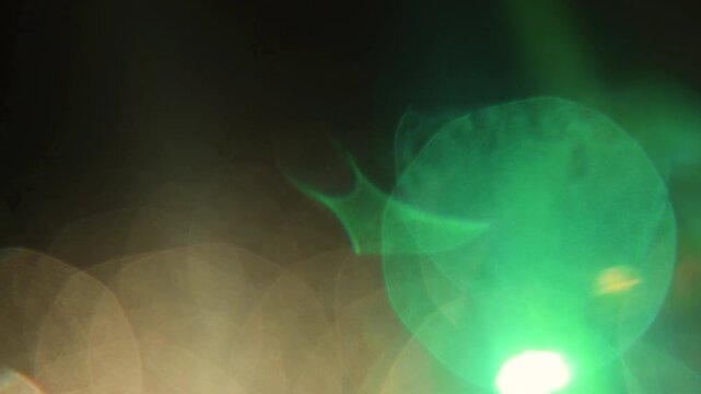 film burn light leak with bokeh and lens flares, perfect for transitions and adding an artistic touch to videos.