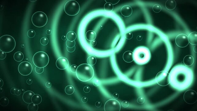 Abstract green bubbles floating over glowing neon circles motion background