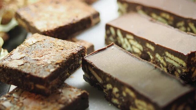 Layered sweet chocolate snacks on a plate 