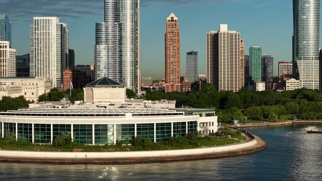 Chicago USA, Drone Shot of Shedd Aquarium Building and Condominiums Around Grant Park on Golden Hour Sunlight