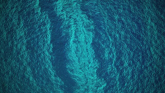 Aerial blue ocean water surface background animation with ripple wave texture