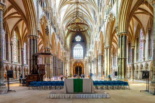 View of the nave inside Lincoln Cathedral with its impressive high vaulted ceiling.