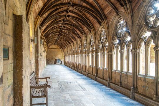 Cloistered walkway at Lincoln Cathedral with its impressive high vaulted ceiling.