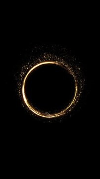 Golden light ring clean circular frame on black, delicate glitter around its rim an open center. elegant logo reveals, premium product, wedding monograms, award titles, stylish celebration animations.
