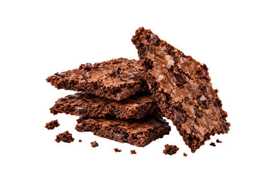Stacked chocolate brownie brittle pieces with crisp crackled tops, rich cocoa texture, melted chocolate chips, and scattered crumbs, isolated on a clean white background.