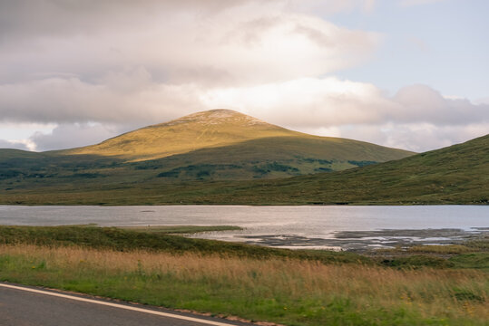 Loch and rolling hills near Ullapool in the Northwest Highlands of Scotland, UK - 4 September 2026.