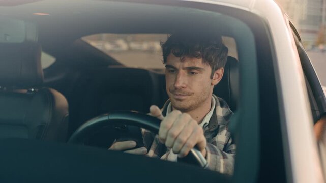 Disappointed stressed Caucasian man driver waiting in traffic jam inside car businessman reading bad news smartphone sad upset male using mobile phone GPS navigation lost connection while driving city