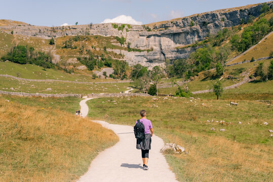 Malham Cove, a dramatic limestone cliff in Yorkshire Dales National Park, North Yorkshire, England, UK - 4 September 2026.