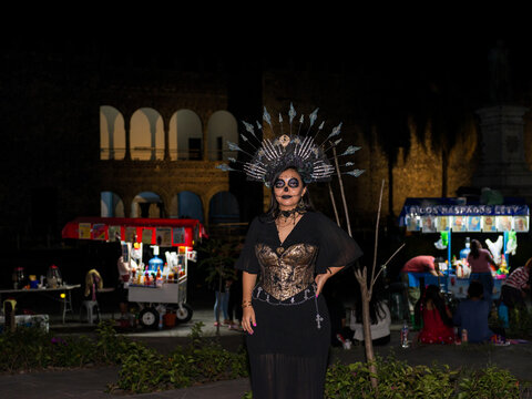 Catrina Woman Wearing a Large Crown at a Day of the Dead Celebration