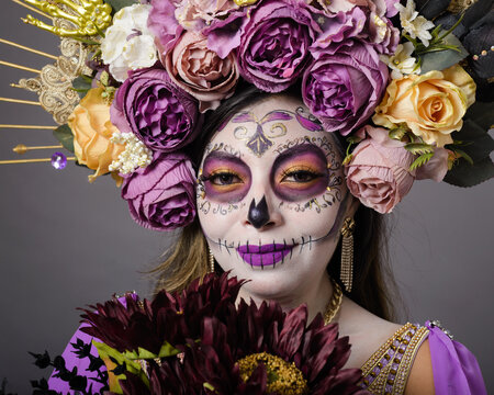 Portrait of Woman With Day of the Dead Makeup and Floral Crown