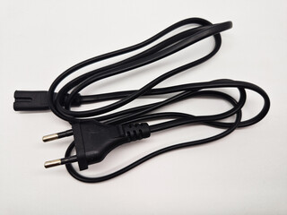 Black AC power cord with 2-prong plug isolated on white background.