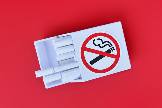 White cigarette pack with no smoking icon as concept for quitting smoking
