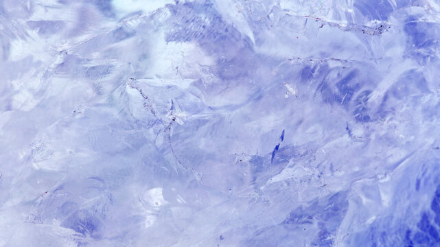amethyst crystal displays frozen textures with cool Purple hues. The icy surface of the gemstone