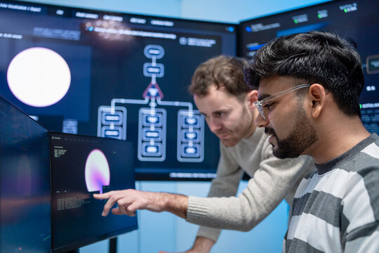 Software engineering use computer working develop AI office are assisting algorithm systems or verifying code. Programmer teamwork using artificial intelligence on laptop analysis or writing coding