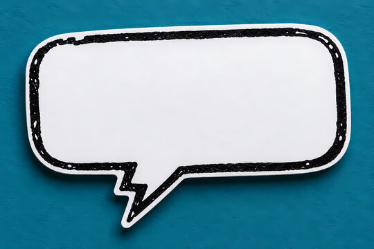 White blank rounded rectangular speech bubble with a distressed black outline and downward pointed tail on a teal blue background, styled as a paper cutout comic chat icon with empty text space