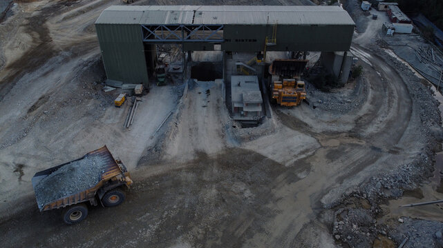 Aerial view of the RTB Bor Grupa Rudnik Bakra Majdanpek copper mine featuring large haul trucks and industrial processing facilities in Majdanpek, Borski okrug, Serbia.