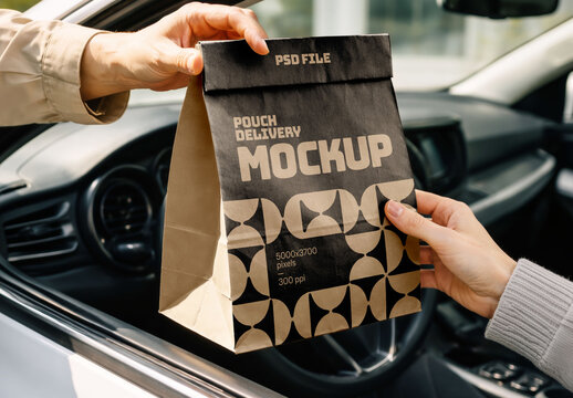 Hand Passing Paper Delivery Bag Through Car Window for Food Packaging and Branding Presentation