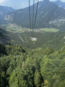 a view of the mountains from a cable car