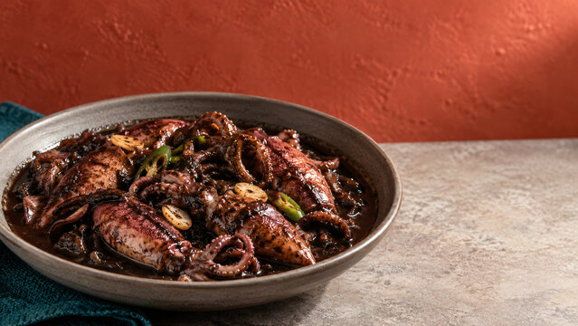 Filipino Adobong Pusit Squid Braised in Garlic Vinegar and Ink