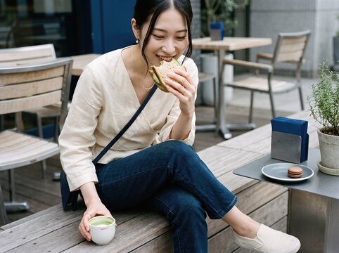 Generative AI, Asian woman enjoying lunch at an outdoor cafe terrace