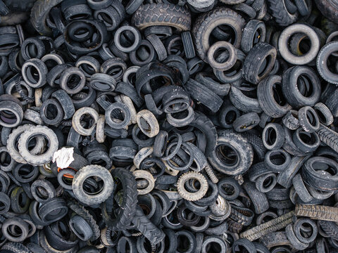 Aerial view of a large pile of discarded tires at a waste management and recycling facility in Laidzes pagasts, Talsu novads, Latvia.