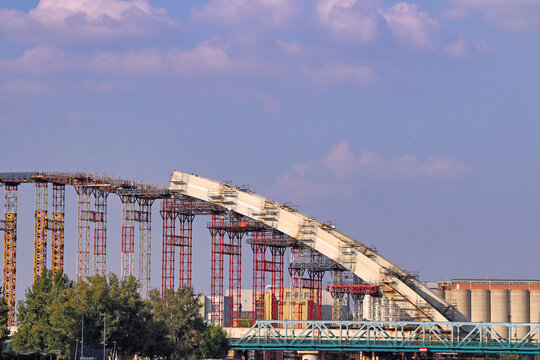 Large Arch Bridge Construction Site with Steel Support Scaffolding Towers