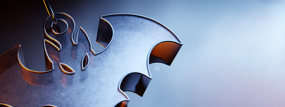 Hanging metallic Halloween bat decoration on an atmospheric background.