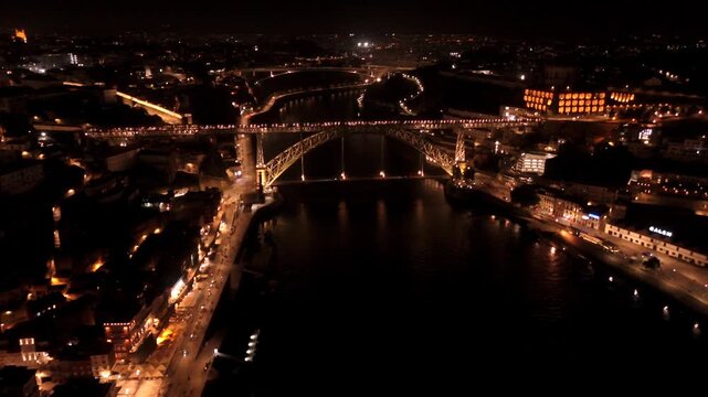 Traffic Crossing Porto's Dom Luis I Bridge Above Douro at Night