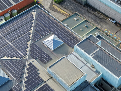 Wantirna South, Victoria, Australia - 03 September 2026: Aerial view of Knox Data Centre with extensive solar panel arrays on the roof and modern industrial architecture.