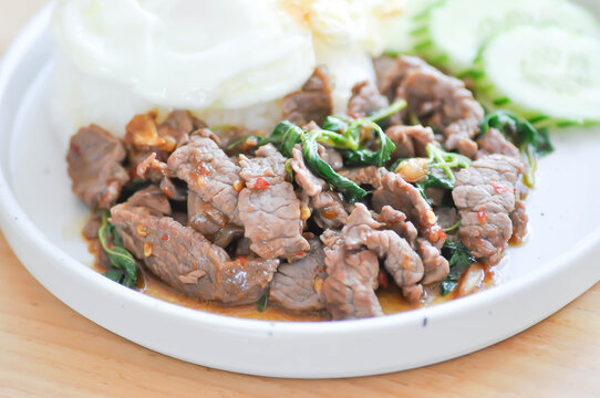 stir fried beef with basil or stewed beef or basil beef with rice and fried egg
