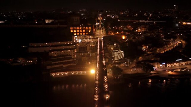Aerial Along Dom Luis I Bridge Upper Deck Toward Porto at Night