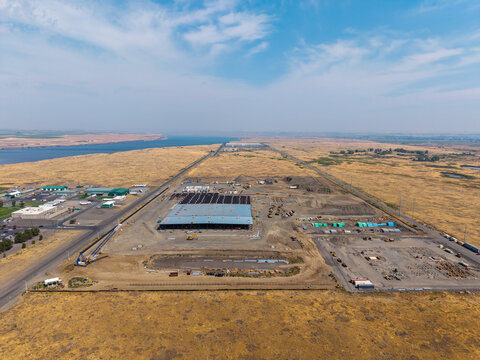 Umatilla, Oregon, United States - 15 August 2026: Aerial view of Umatilla Sabey Data Center surrounded by dry fields and industrial infrastructure near the Columbia River.