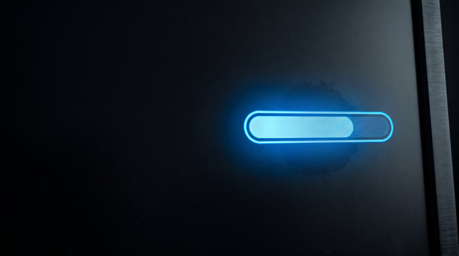 Glow progress bar loading symbol indicator on dark digital electronic device display screen