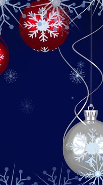 Animation of christmas baubles decorations with snow falling