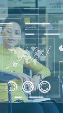 Animation of graphs, loading circles, bars, diverse handicap woman discussing reports with coworkers