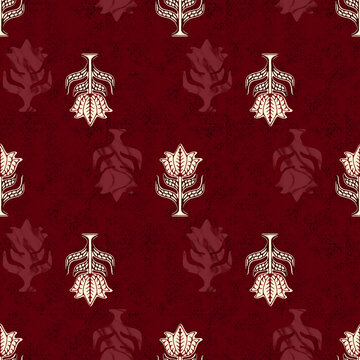 This image features a seamless block-print textile pattern set against a deep maroon-red background with a subtle, distressed textured finish. It showcases traditional stylized floral  motifs 
