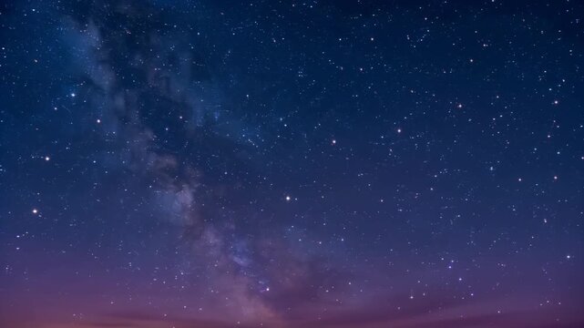 Abstract deep blue cosmic night sky background with glowing golden horizon and floating stars