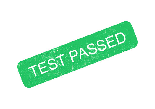 Green rubber stamp with test passed text