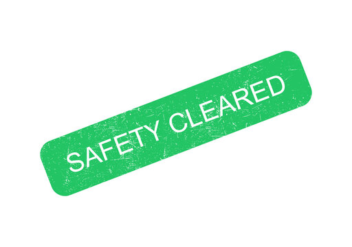 Green safety cleared badge with white text