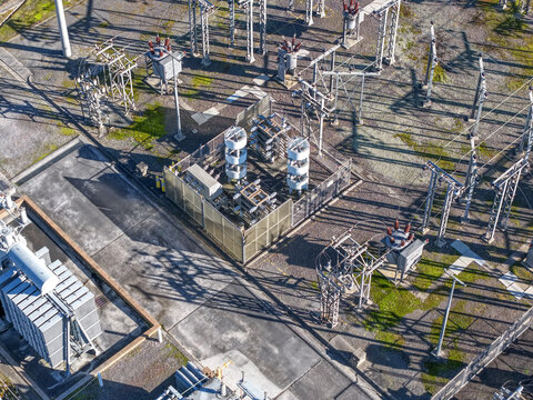 Bayswater North, Victoria, Australia - 29 August 2026: Aerial view of Bayswater Zone Substation with electrical transformers, switchgear, and metal infrastructure.