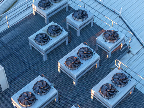 Kilsyth South, Australia - 29 August 2026: Aerial view of the Micron21 Data Centre rooftop featuring multiple industrial cooling fans and HVAC units arranged on a metal grid platform.