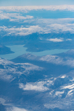 View of Parque Nacional Los Glaciares featuring snow-capped mountains, glaciers, and turquoise glacial lake waters in Lago Argentino Department, Santa Cruz Province, Argentina.