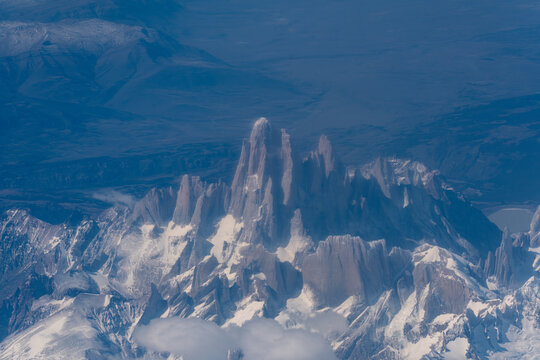 View of the snow-capped peaks of Mount Fitz Roy within Parque Nacional Los Glaciares, featuring jagged granite spires and glaciers in Lago Argentino Department, Santa Cruz Province, Argentina.