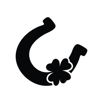 Horseshoe and clover lucky charm for good luck and protection.
