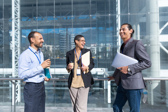 Businessman and businesswoman enjoy a coffee break at work
